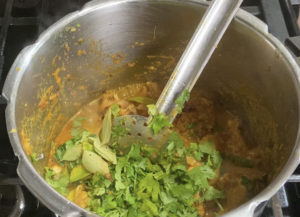 Mint-Coriander leaves added to chicken masala|pressure cooker chicken Masala|kothiayvunu.com